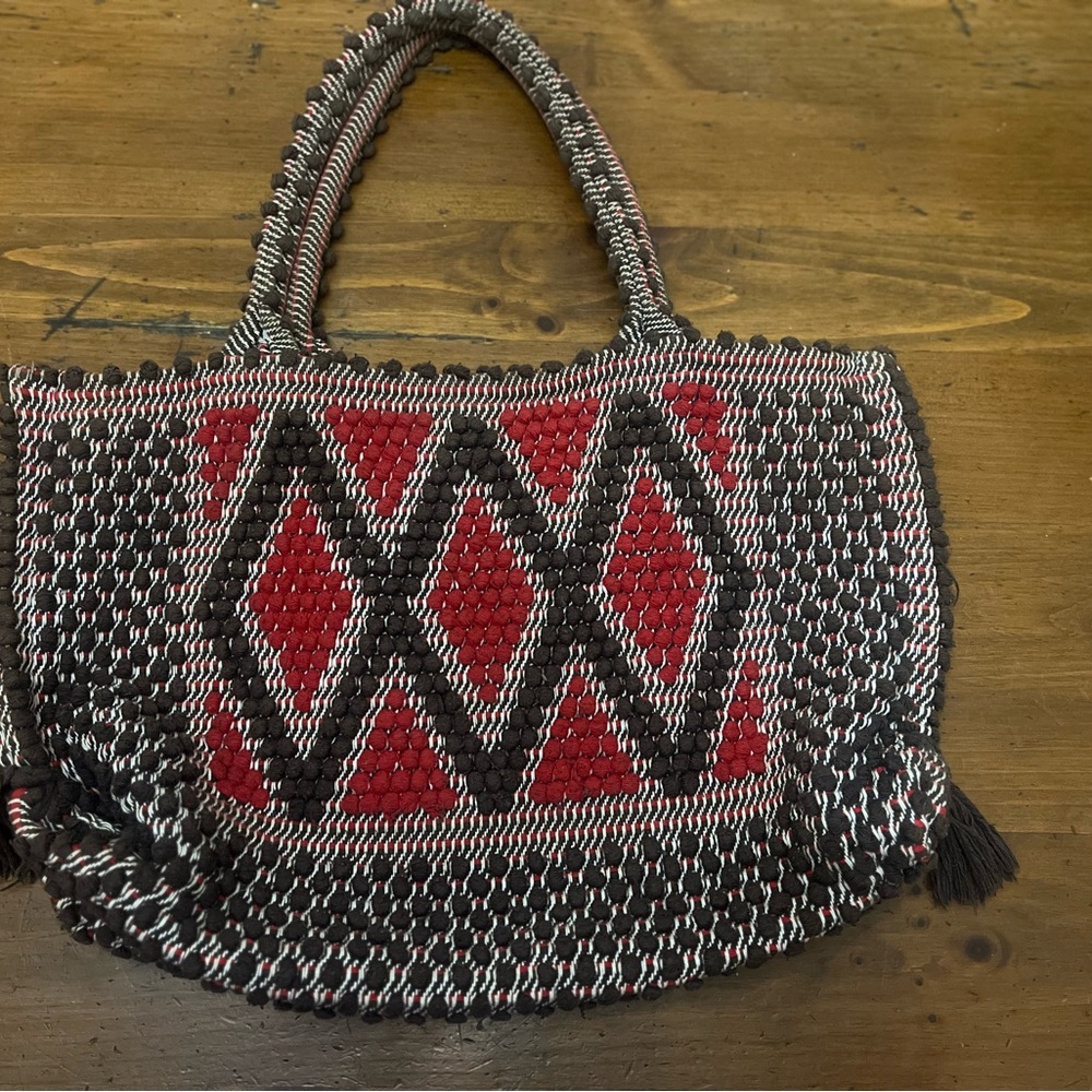 Antonello Tedde Boho Bag in red/brown and off white. 18” wide 12” high.